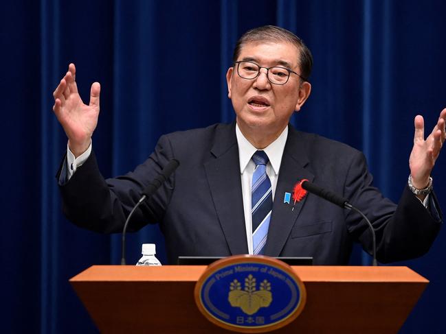 (FILES) This file photo taken on October 9, 2024 shows Japan's Prime Minister Shigeru Ishiba speaking during a press conference at the prime minister's official residence in Tokyo. Japan votes on October 27, 2024 in a snap election with the ruling LDP party at risk of losing its majority for the first time in 15 years, in a severe blow to new premier Shigeru Ishiba. (Photo by David Mareuil / POOL / AFP) / TO GO WITH Japan-vote,ADVANCER by Hiroshi HIYAMA and Simon STURDEE