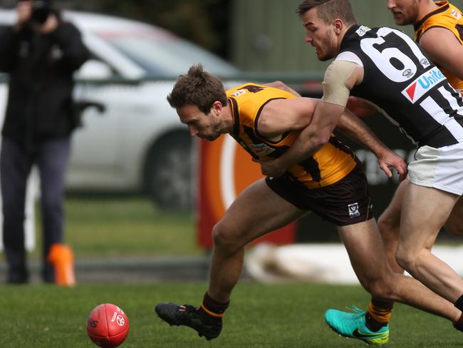 Tassie talent: Sam Iles over the ball for Box Hill Hawks.