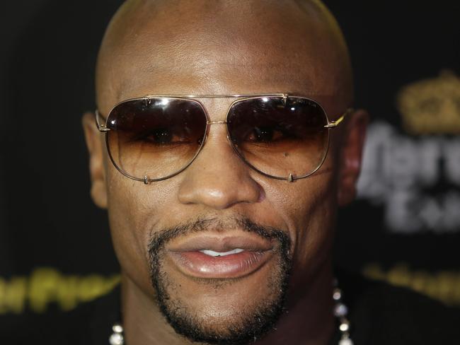 Floyd Mayweather talks to reporters during a news conference in New York, Monday, July 14, 2014. Mayweather will fight Marcos Maidana for the second time in Las Vegas, Nevada on Sept. 13, 2014. (AP Photo/Seth Wenig)