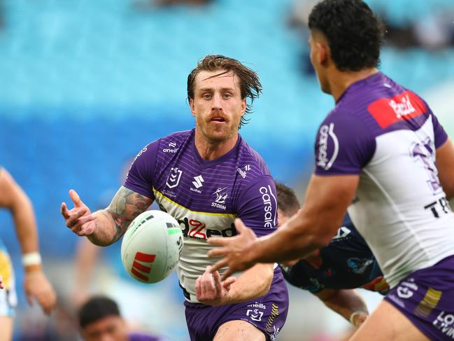 GOLD COAST, AUSTRALIA – MAY 31: Cameron Munster of the Storm passes during the round 13 NRL match between Gold Coast Titans and Melbourne Storm at Cbus Super Stadium, on May 31, 2025, in Gold Coast, Australia. (Photo by Chris Hyde/Getty Images)