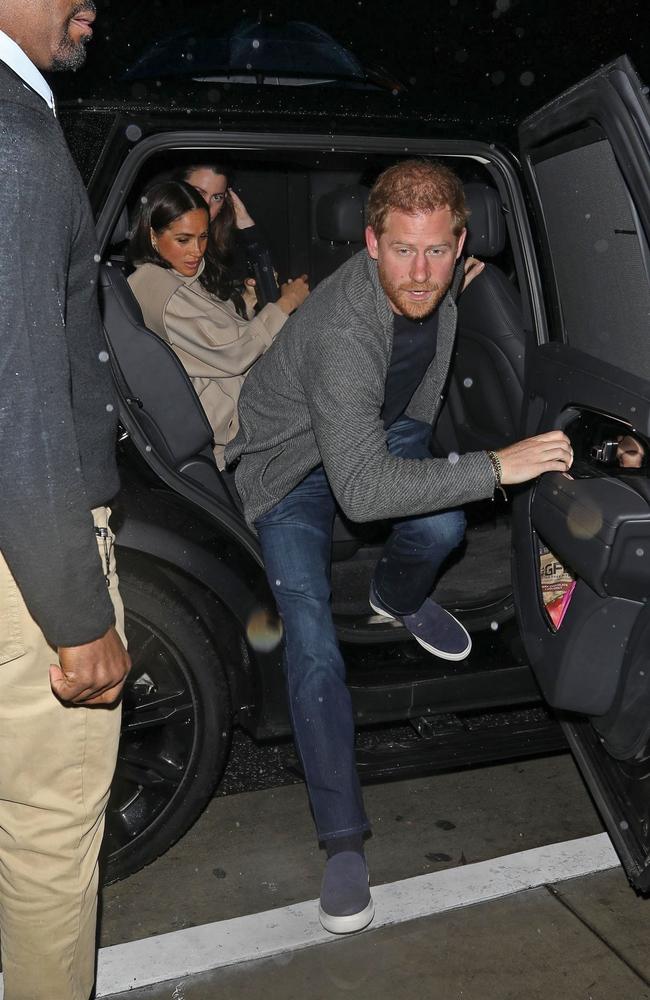 A casually dressed Prince Harry exits the car as the Sussexes arrive at the San Vicente Bungalows, a private members’ club. Picture: The Daily Stardust / ShotbyNYP/MEGA / BACKGRID