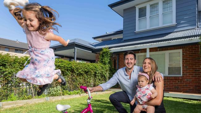 Sarah Cristanelli and partner Brandon Bailey  with kids Milena, 3, and Zoe, 9 at their 20 Winsome St, Mentone home.Melbourne's housing market fell $66 a day in 2024 as a slew of landlords listed investment properties in response to increased land tax costs. Picture: Jason Edwards