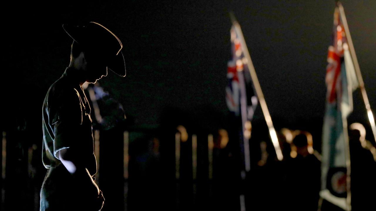 The mood was solemn as the Last Post sounded at the Anzac Day dawn service at Pinegrove Memorial Park in Minchinbury. Picture: Angelo Velardo