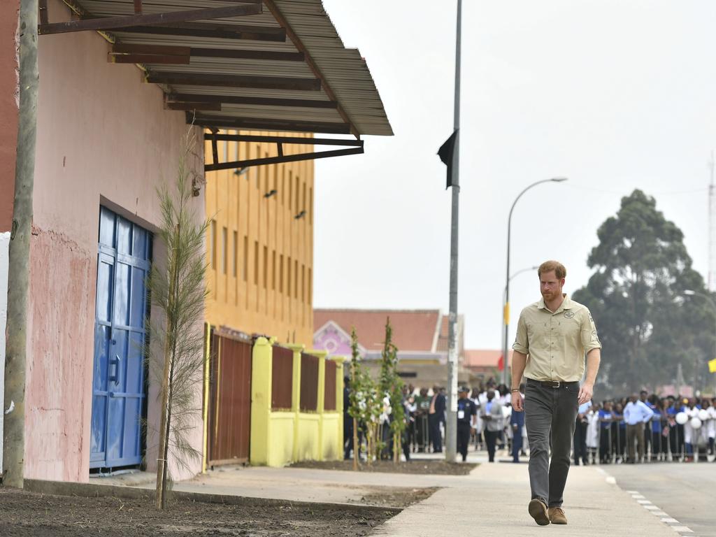 Britain's Prince Harry walks on Princess Diana Street in Huambo, Angola. Picture: Dominic Lipinski/Pool Photo via AP.