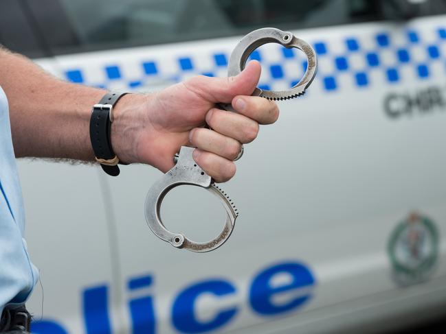 NSW police at coffs harbour boat ramp, arrest , gun, shots, handcuffsPhoto: Trevor Veale / The Coffs Coast Advocate