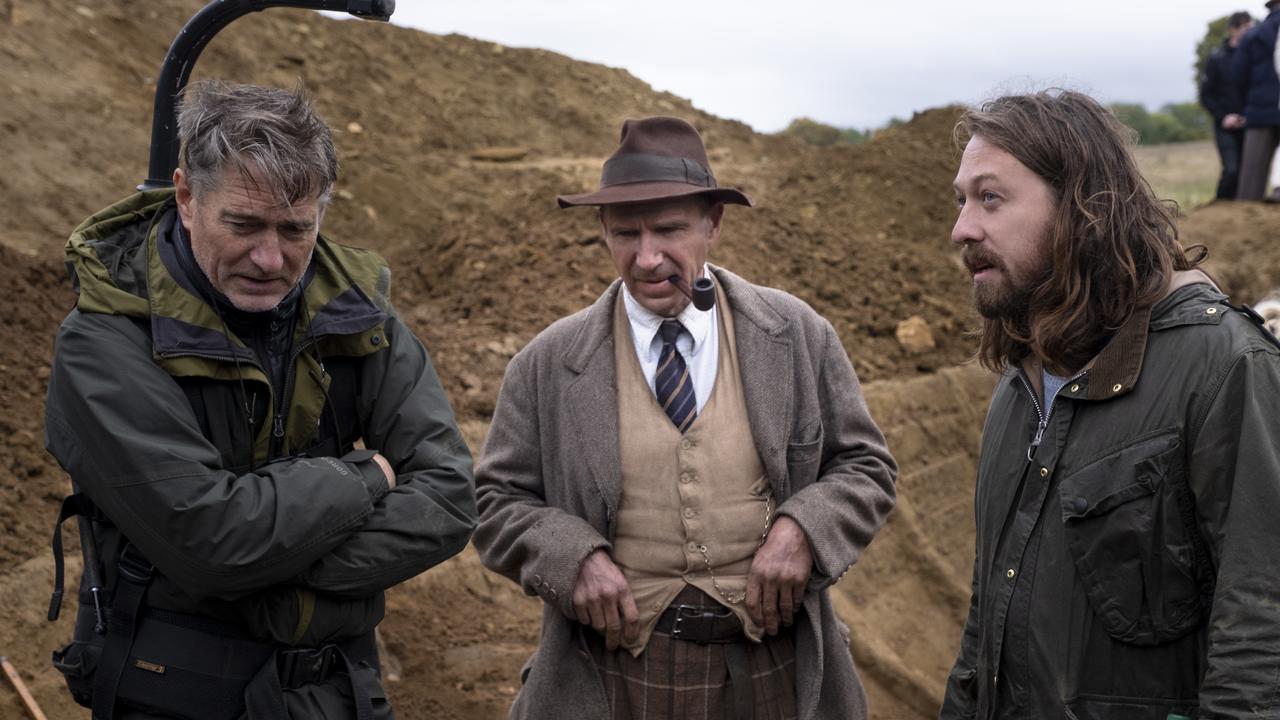 Simon Stone (right) with cinematographer Mike Eley and Ralph Fiennes on the set of The Dig. Picture: Larry Horricks/Netflix