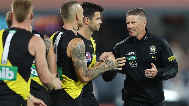 Hardwick and the players during the Grand Final. Picture: Michael Klein