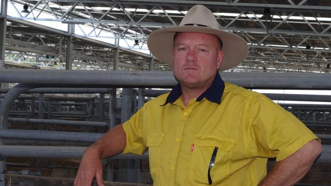 Greg Mirabella in his role as Wangaratta branch president of VFF at the Wangaratta yards.