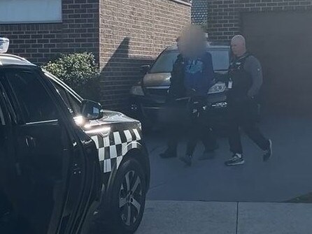 A man is arrested in Officer in a probe linked to the illicit tobacco trade. Picture: Victoria Police