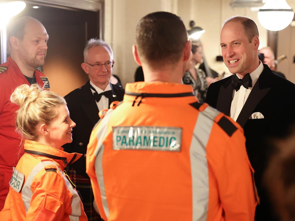 The royal chats with Air Ambulance pilots, doctors and paramedics. Picture: Getty Images