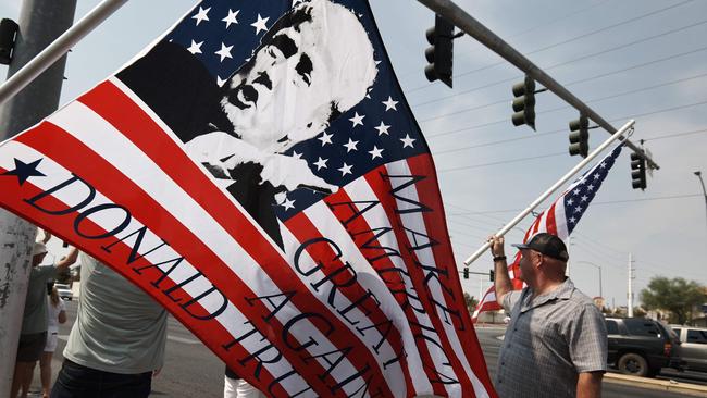 Protesters rally against a mask mandate, many showing support for Donald Trump, in Las Vegas on Saturday. Picture: AFP