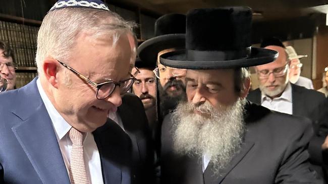 Anthony Albanese tours the fire-bombed Adass Israel synagogue with community leaders.