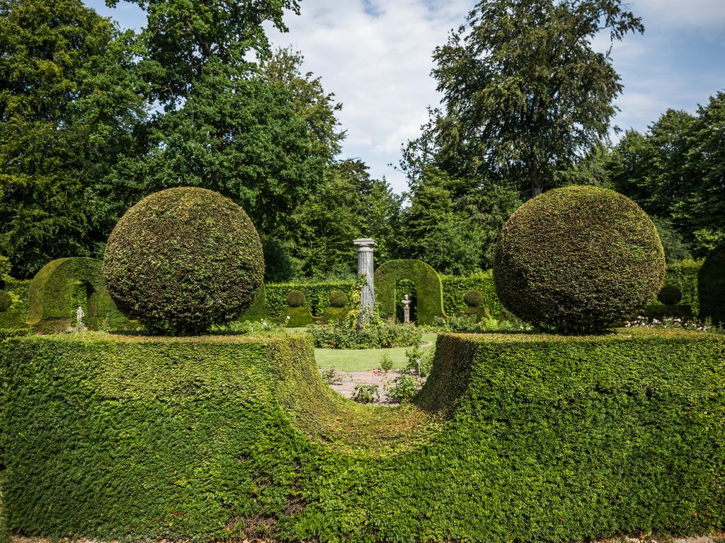 Denmarks’ Fredensborg Castle Garden with sculptures and monuments.