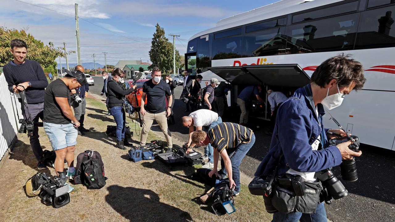 Media grab their equipment ready for another visit. Picture: Toby Zerna