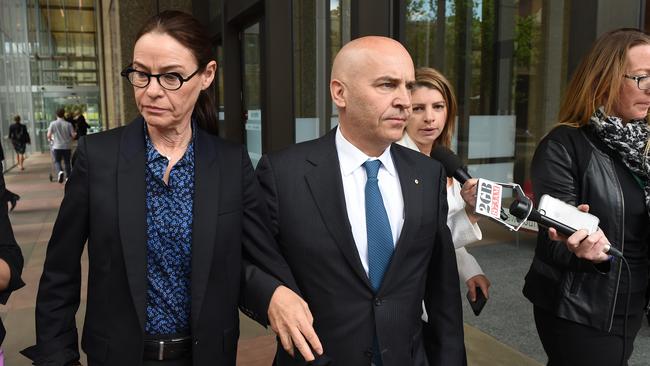 Surrounded be media Oliver Curtis’ parents Nick and Angela Curtis show up at their son’s appeal to have his prison sentence reduced. Picture: AAP /Dean Lewins