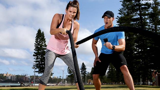 Simon Bennett and Bethany Wall doing a HIIT workout. 