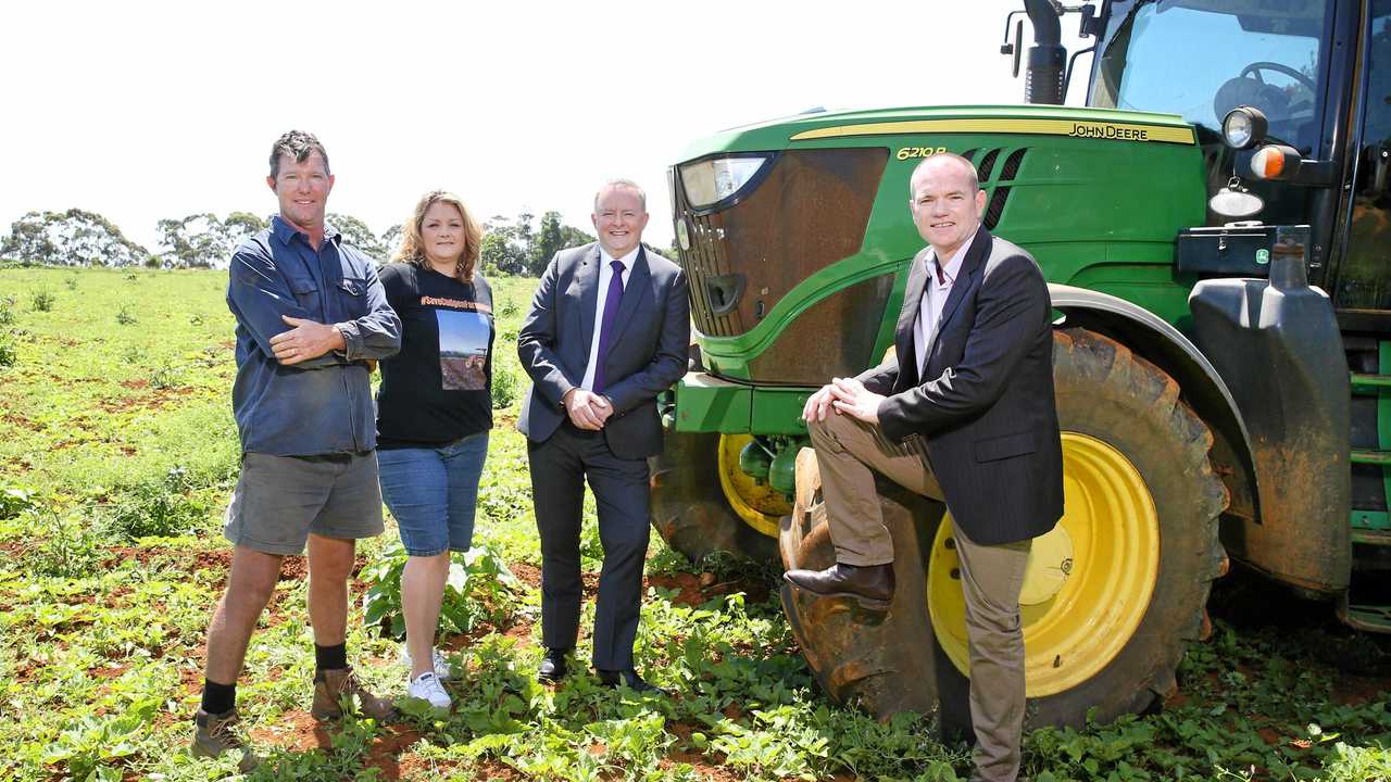 Sweet potato farmers James and Hayley Paddon are joined by Federal Labor MP Anthony Albanese and State Labor candidate for Tweed, Craig Elliot, to discuss their opposition to the new Tweed hospital site at Cudgen. Picture: Scott Powick