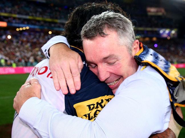 Coach Paul Green celebrates the Cowboys’ 2015 grand final victory with skipper Johnathan Thurston.