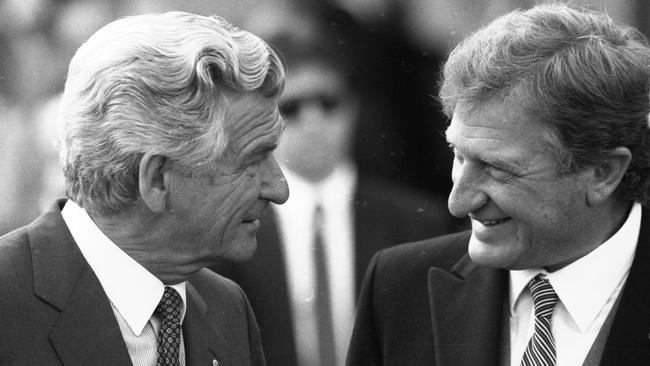 Elliott, pictured at the races with Bob Hawke, was federal president of the Liberal Party.