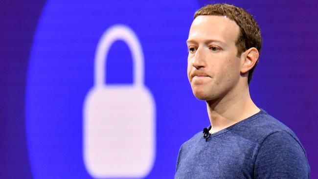 (FILES) In this file photo taken on May 1, 2018, Facebook CEO Mark Zuckerberg speaks during the annual F8 summit at the San Jose McEnery Convention Center in San Jose, California. It has turned into a brutal reality check for Facebook. The social network star -- which had weathered storms over privacy and data protection -- is now looking ahead at a cloudier financial future that threatens to end its years-long breakneck growth pace. Shares in Facebook plummeted 19 percent to $175.30 in early trade Thursday, wiping out some $100 billion -- believed to be the worst single-day evaporation of market value for any company. / AFP PHOTO / JOSH EDELSON