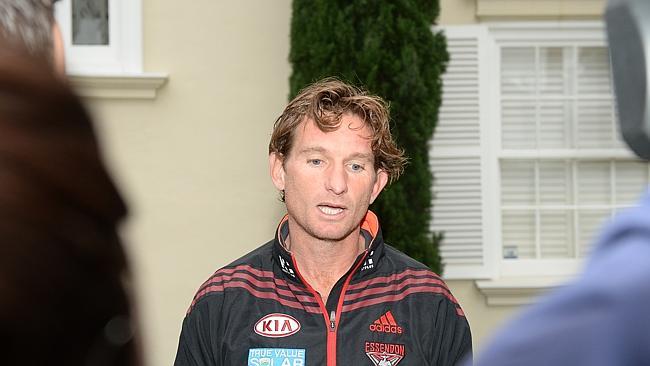 April 15, 2013: Essendon coach James Hird talks to media outside his Toorak home.