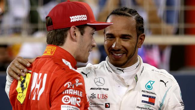 Pole position qualifier Charles Leclerc of Monaco and Ferrari is congratulated by third placed qualifier Lewis Hamilton of Great Britain and Mercedes GP. Picture: Charles Coates/Getty Images