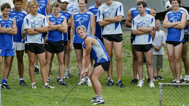 Daniel Harris and teammates play golf at Arden Street.