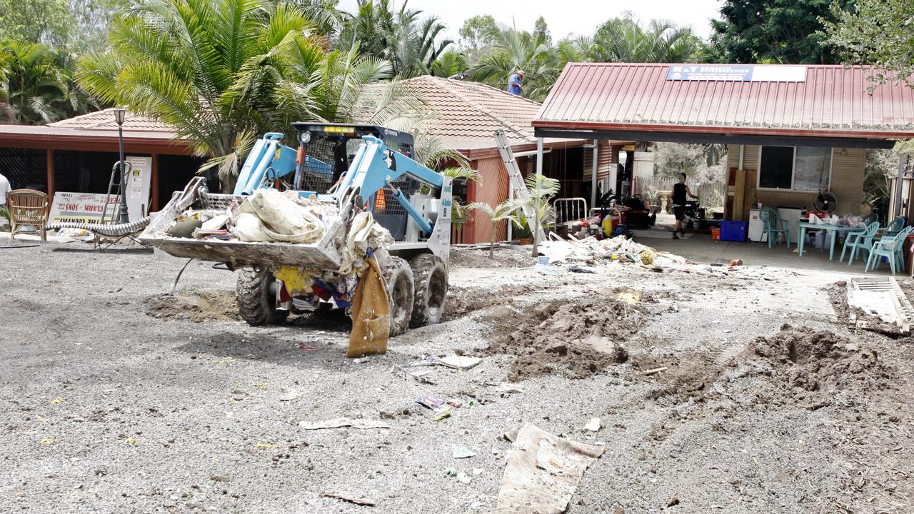 The flood clean up begins at Queensborough Pde, Karalee. Photo: Sarah Harvey/ The Queensland Times