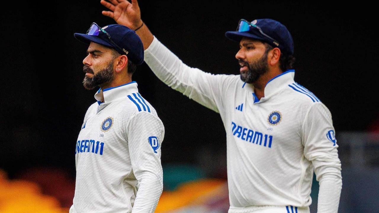 Indian captain Rohit Sharma (right) has left the door ajar to return to an opening spot in the Boxing Day Test. Picture: Patrick Hamilton / AFP