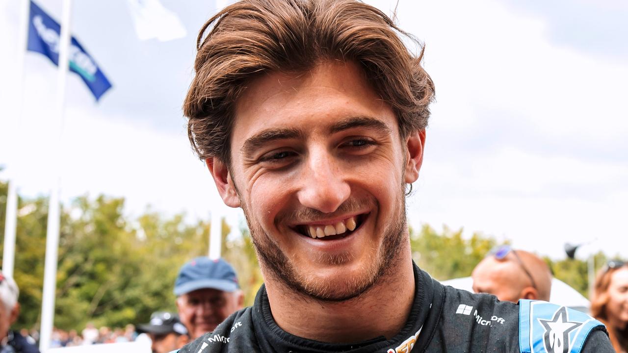 CHICHESTER, ENGLAND - JULY 13: Jack Doohan, reserve driver for Alpine F1 is interviewed with his dad Mick Doohan, former Grand Prix motorcycle racer during Day Three of the Goodwood Festival of Speed at Goodwood on July 13, 2024 in Chichester, England. (Photo by James Bearne/Getty Images)