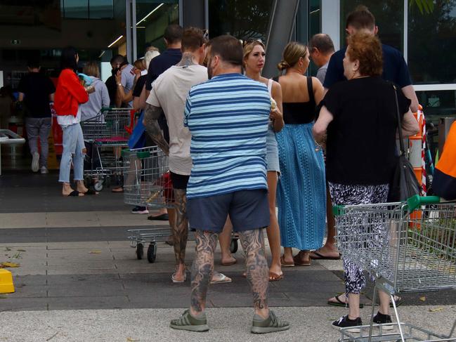 Panic buying of groceries at Skygate Woolworths store due to a three day lockdown announced by the Premier and Chief Health Officer starting Friday 8th January at 6pm, Hendra Friday 8th January 2021 Picture David Clark