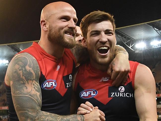 Nathan Jones (left) and Jack Viney of the Demons react after the First Semi Final between the Hawthorn Hawks and the Melbourne Demons in Week 2 of the AFL Finals Series at the MCG in Melbourne, Friday, September 14, 2018. (AAP Image/Julian Smith) NO ARCHIVING, EDITORIAL USE ONLY