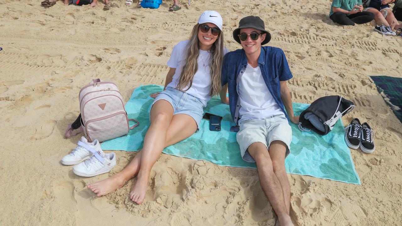 Isabel Woodhouse and Matt Farrington enjoying the inaugural Pacific Air Show over Surfers Paradise. Picture: Glenn Campbell