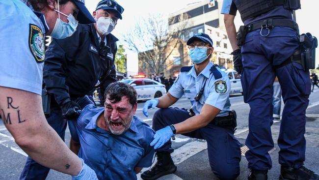A protester is arrested during Saturday’s rally, with police hoping to stop similar scenes from unfolding this weekend. Picture: NCA NewsWire/Flavio Brancaleone