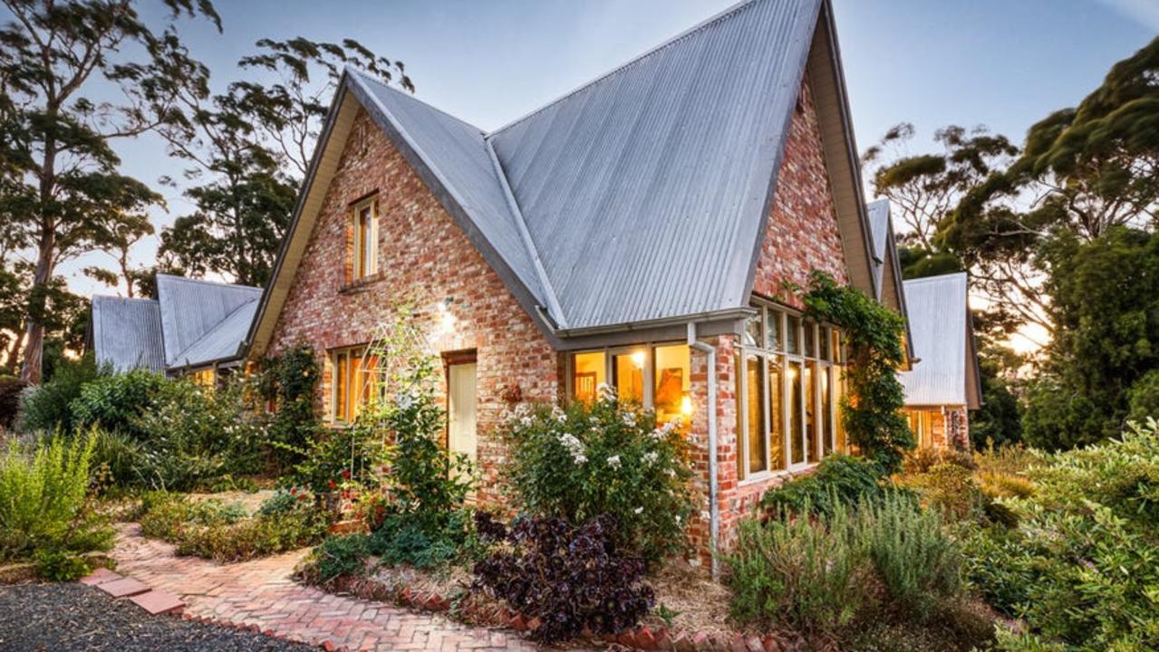 A historic property made from recycled materials is for sale in Brown Hill.