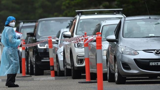 Northern beaches residents attend a drive thru pop up testing clinic at Newport Beach. Picture: Jeremy Piper