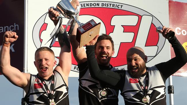 Harley Short, Michael Farrelly and Osama Saad celebrate the 2018 premiership. Picture: Hamish Blair