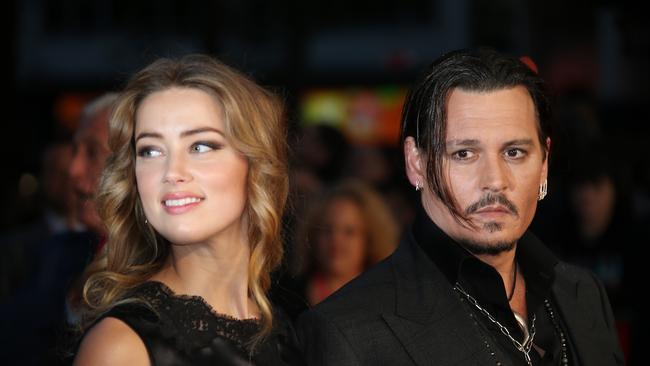 In happier times, Amber Heard and Johnny Depp arrive at the premiere of Depp's film Black Mass, at the London film festival. Photo: Joel Ryan/Invision/AP, File