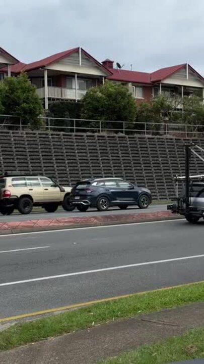 A scene being filmed on Robina Parkway for Runner.