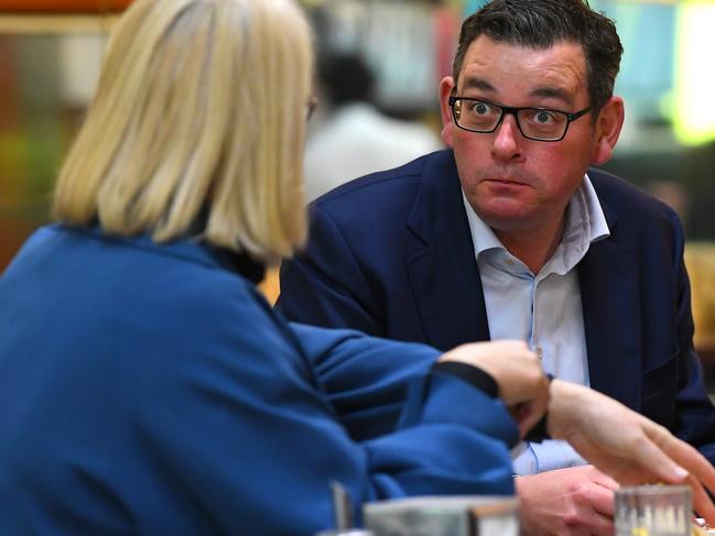 Victorian Premier Daniel Andrews (right) and Lord Mayor of Melbourne Sally Capp have lunch at Pellegrini's Espresso Bar, Melbourne, Monday, June 1, 2020. Social distancing measures have been relaxed today allowing pubs, cafe and restaurants to have uptown 20 patrons dining inside. (AAP Image/James Ross) NO ARCHIVING