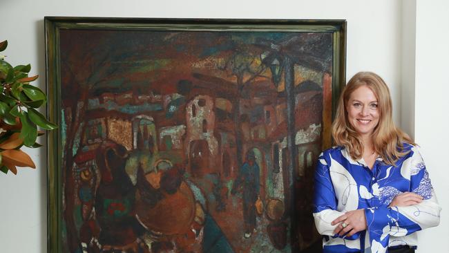 Saskia Havekes with a painting by her father Gerard. Picture: John Feder