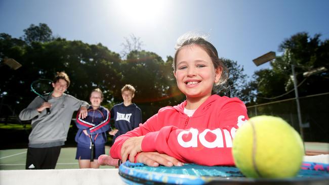 Evie Joyce, 7, of Richlands, Cole Armstrong, 14, from 17 Miles Rocks, Maddy Joyce, 12, Richlands, Taine Parkinson, 13, from 17 Mile Rocks, Ash Barty's old tennis club. Picture: Steve Pohlner