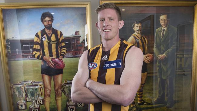 Sam Frost tries on his new colours after being traded to Hawthorn. Picture: Michael Klein