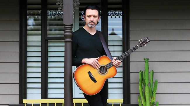 Something For Kate frontman Paul Dempsey plays Situation Room, the first single from the band’s upcoming seventh album, for Review’s Isolation Room – a video series starring top musicians, writers and artistic performers recorded at their homes. Picture: Aaron Francis / The Australian