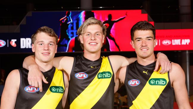 MELBOURNE, AUSTRALIA - NOVEMBER 20: Richmond's draft picks, Sam Lalor, Josh Smillie and Harry Armstrong pose for a photo during the 2024 Telstra AFL Draft at Marvel Stadium on November 20, 2024 in Melbourne, Australia. (Photo by Dylan Burns/AFL Photos via Getty Images)