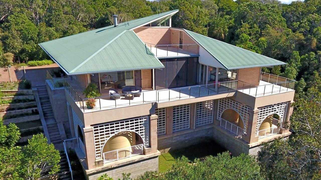 VALUE BUY: The house at 830 Fingerfield Rd sits on 77ha of sub-tropical rainforest.