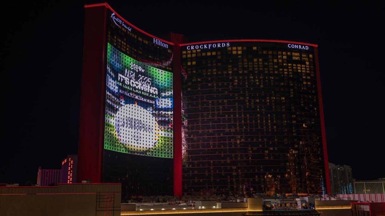 The side of Resorts World was lit up for rugby league. . Picture: Bryce Cacpal