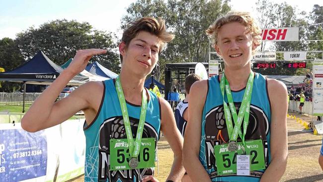 COOL EFFORTS: Ipswich and District Athletic Club achievers Alex Davies and Jude Thomas enjoy their latest Park2Park successes. Picture: Vic Pascoe