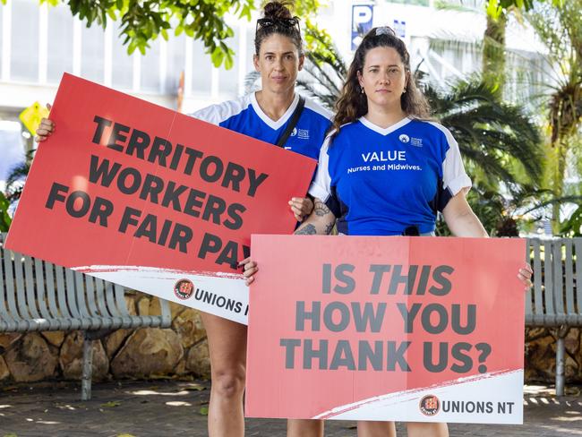 RDH nurses Steph Watt and Dale Ricketts protesting against the wage freeze at the Unions NT rally on September 1. Picture: Floss Adams