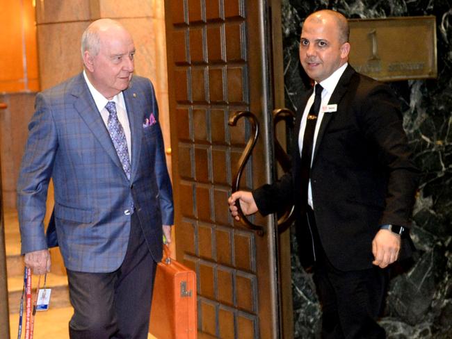 Alan Jones leaves his apartment building on Tuesday evening. Picture: Jeremy Piper